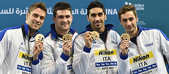Marco Orsi con la staffetta 4x50 bronzo ai mondiali di Doha