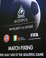 La locandina della conferenza internazionale Interpol sul calcioscommesse