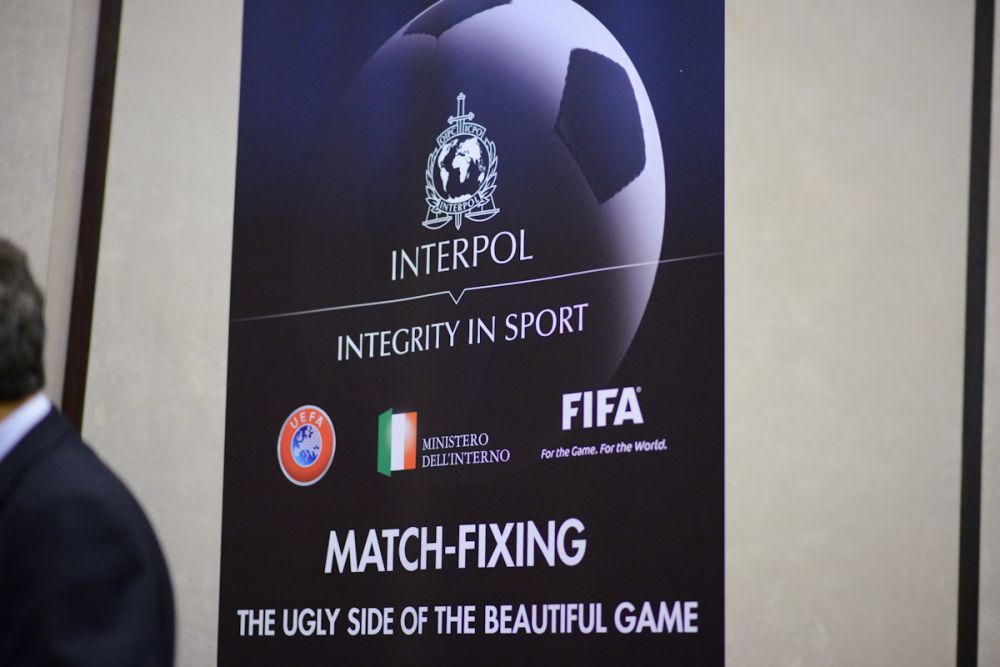 La locandina del convegno Interpol e Federazione italiana giuoco calcio